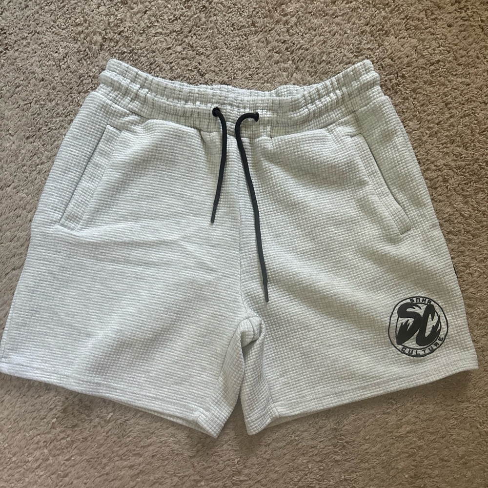 Native Language shorts - SNKA Culture Logo